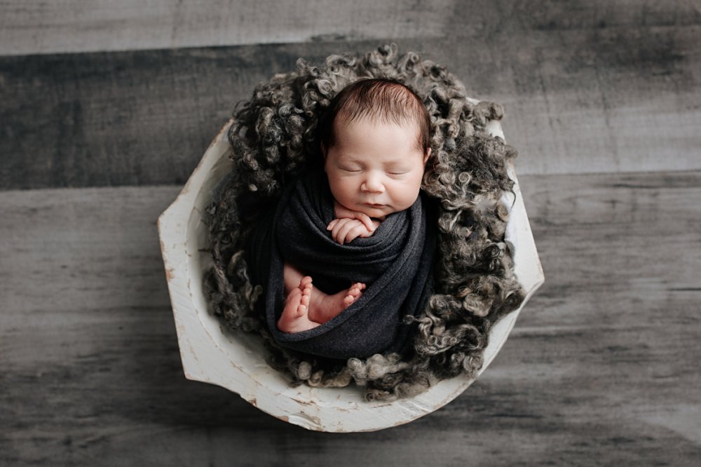 Little newborn baby boy, looking curiously at camera, posed picture Stock  Photo - Alamy